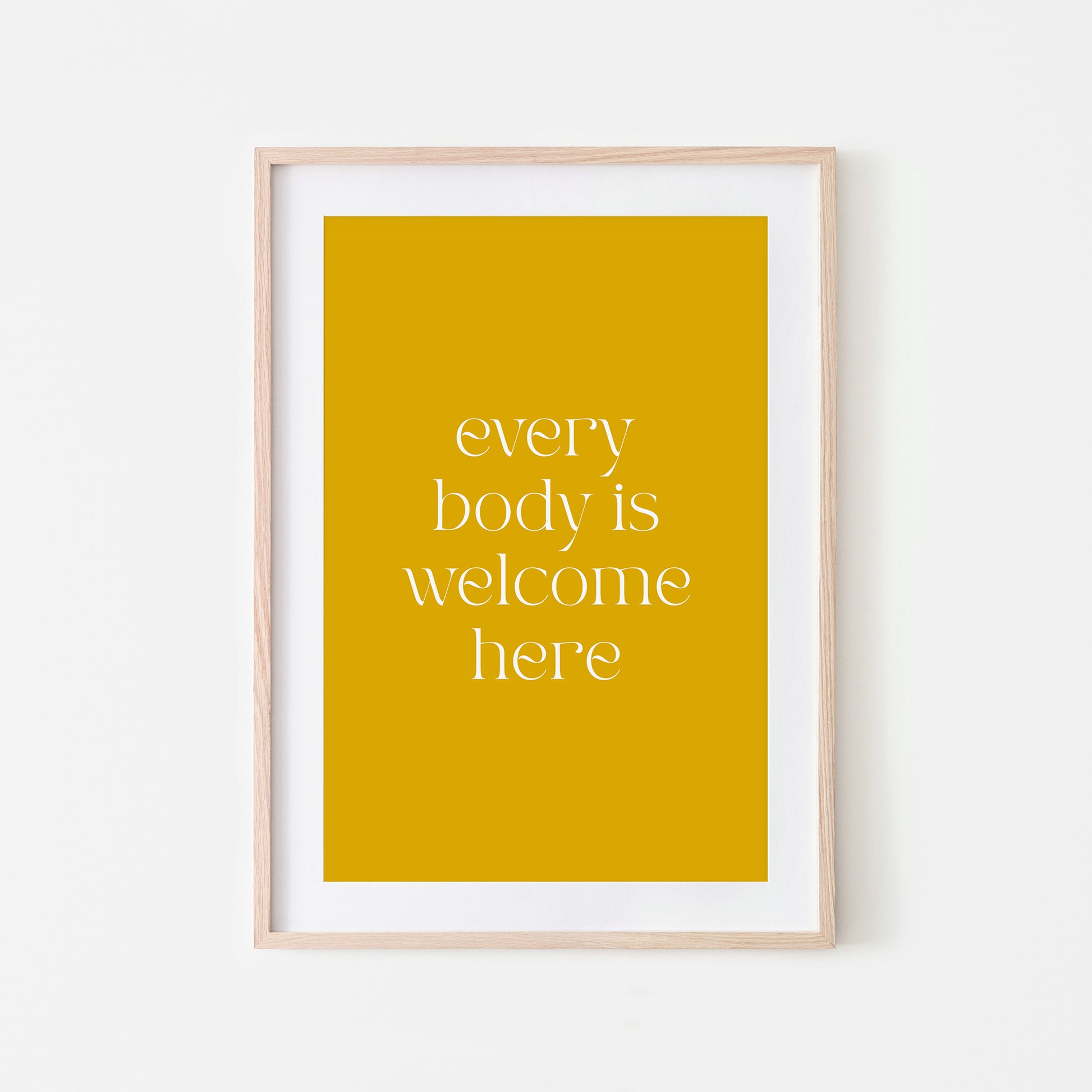 Every-Body-is-Welcome-Here-Quote-Wall-Art-in-Mustard-Website-Main-Image