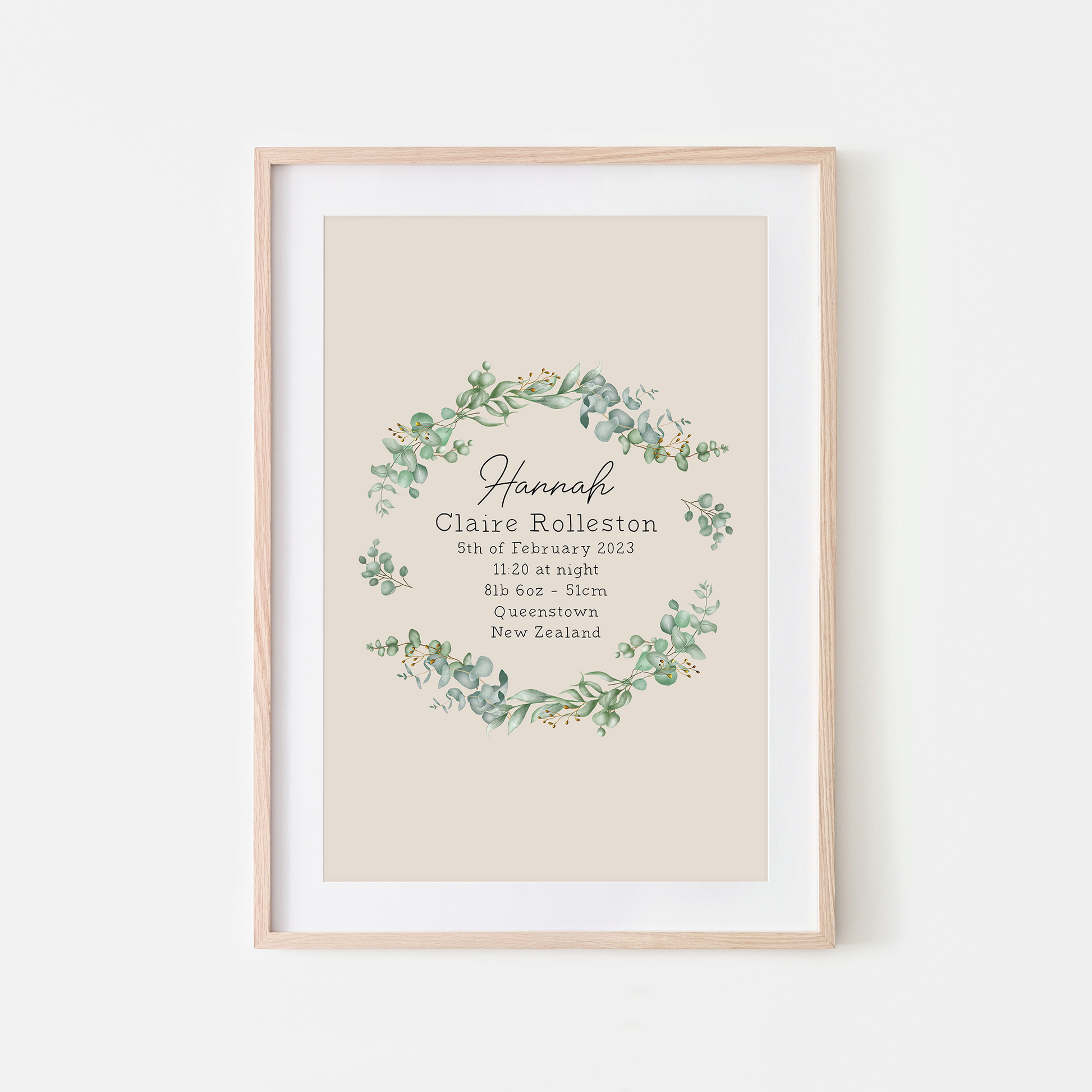 The-Branches-Eucalyptus-Leaf-Birth-Poster-in-Sand-Cursive